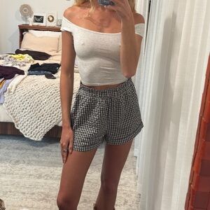 Rumored Light Gray Top. Small section of thread missing at hem (pictured).